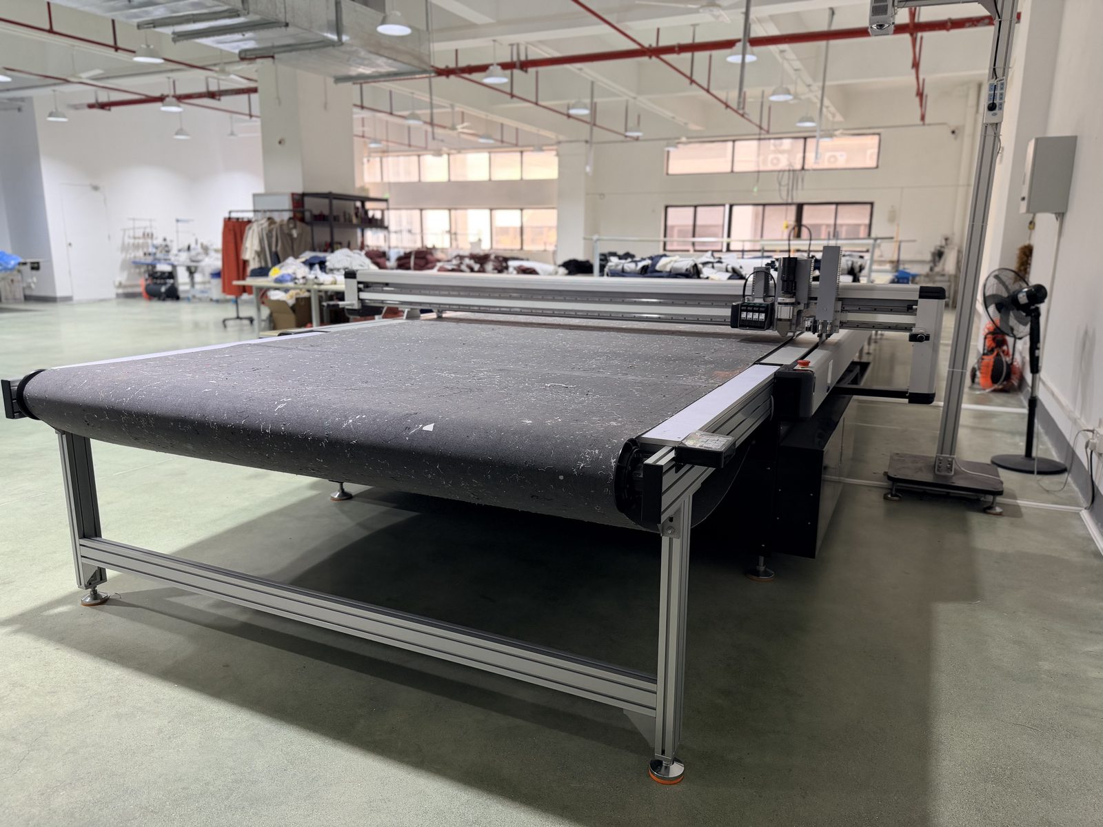 Guangdong Golden Shine Limited factory floor with automated cutting machine